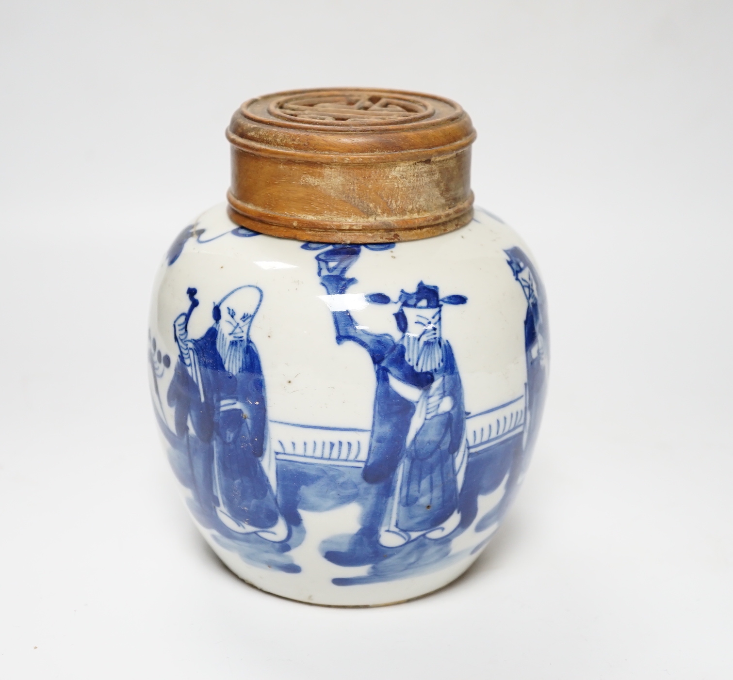 A Chinese blue and white jar, 19th century, with pierced hardwood lid, 15cm high